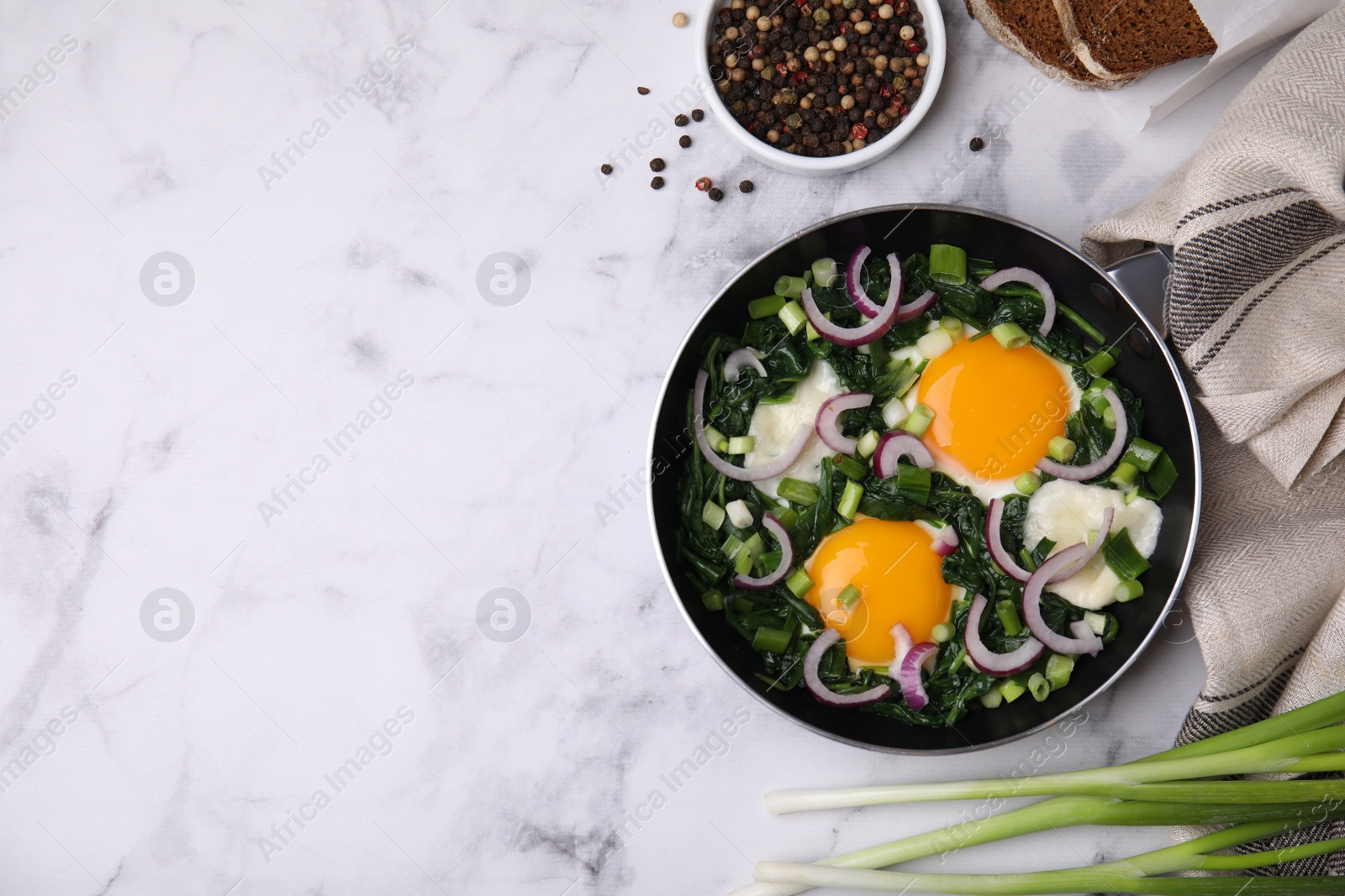 Photo of Flat lay composition with tasty Shakshouka and ingredients on white marble table. Space for text