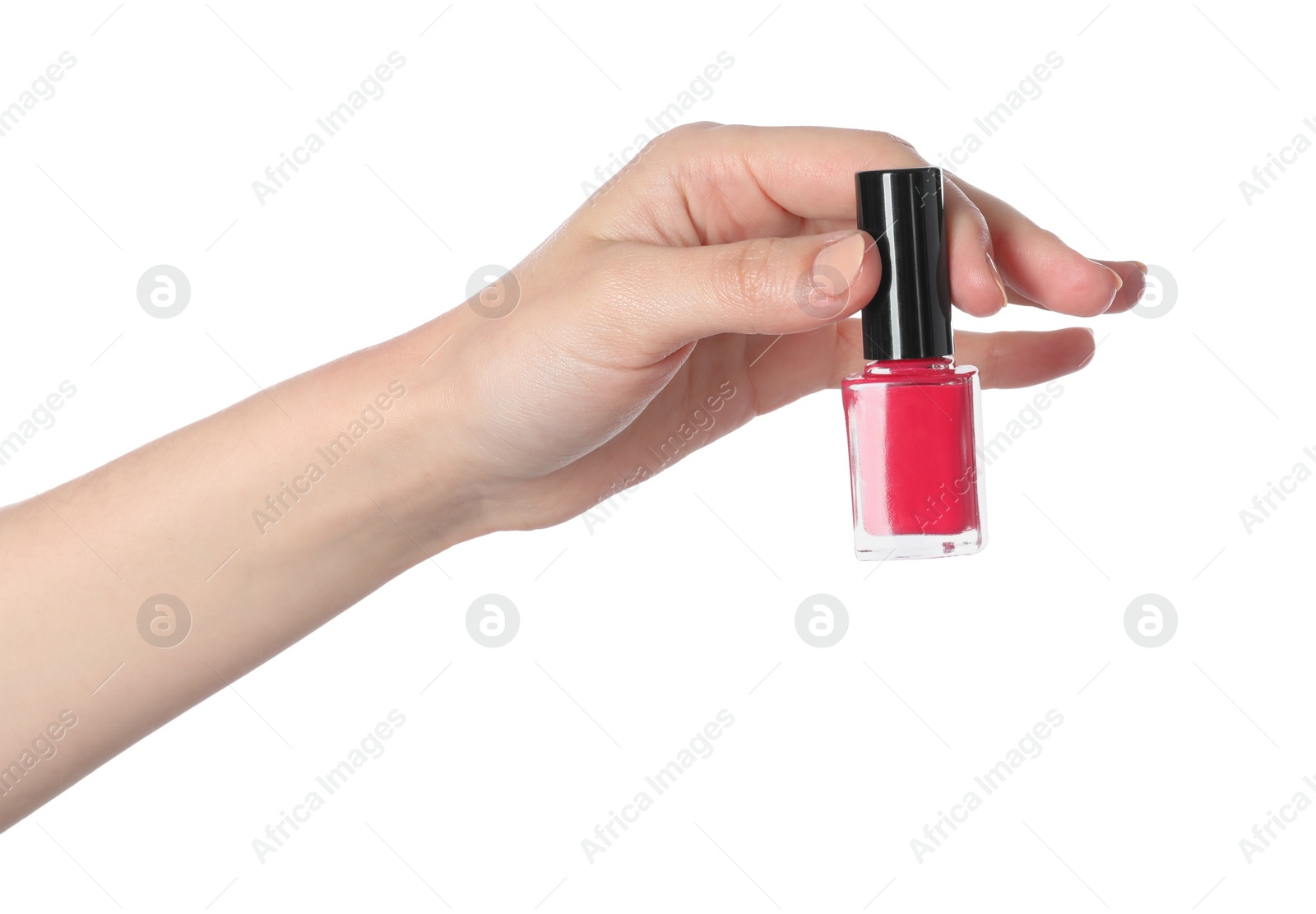 Photo of Woman holding nail polish on white background, closeup