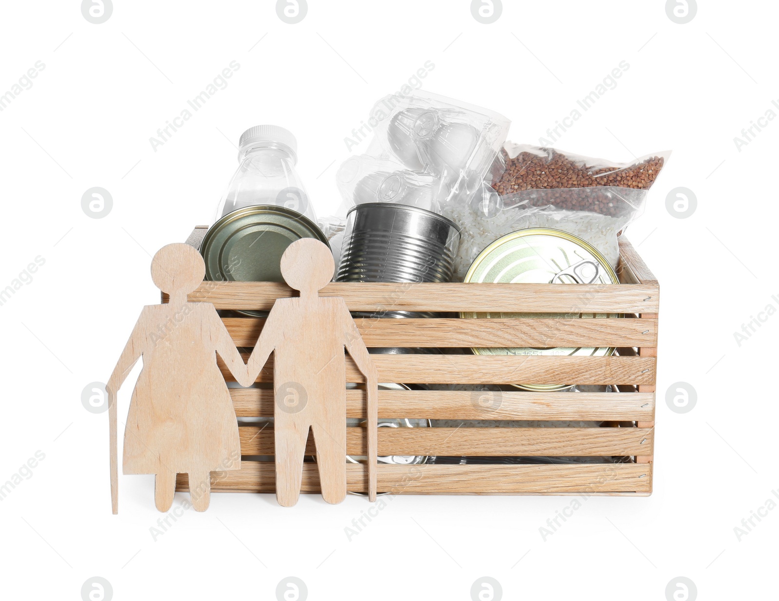 Photo of Humanitarian aid for elderly people. Donation box with food products and figure of senior couple isolated on white