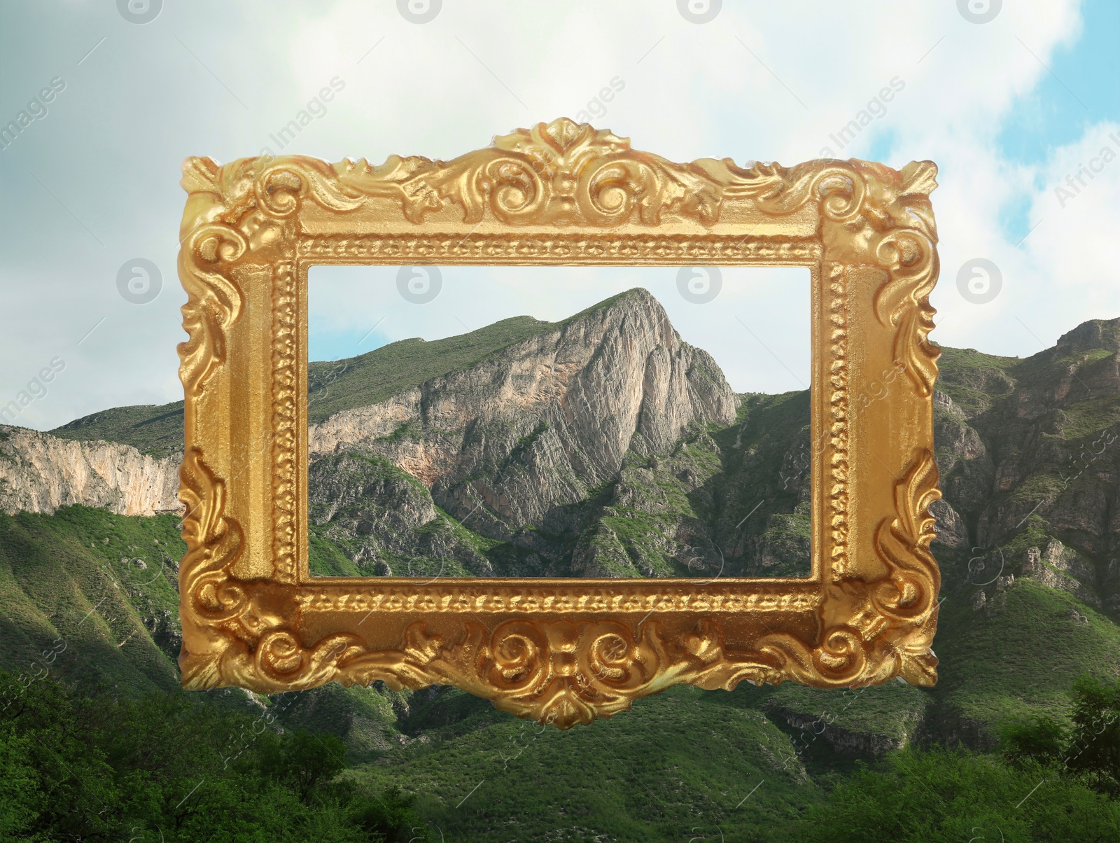 Image of Vintage frame and beautiful mountains under blue sky with clouds