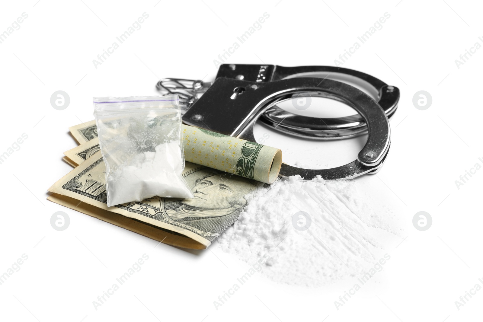 Photo of Cocaine, money bills and handcuffs on white background