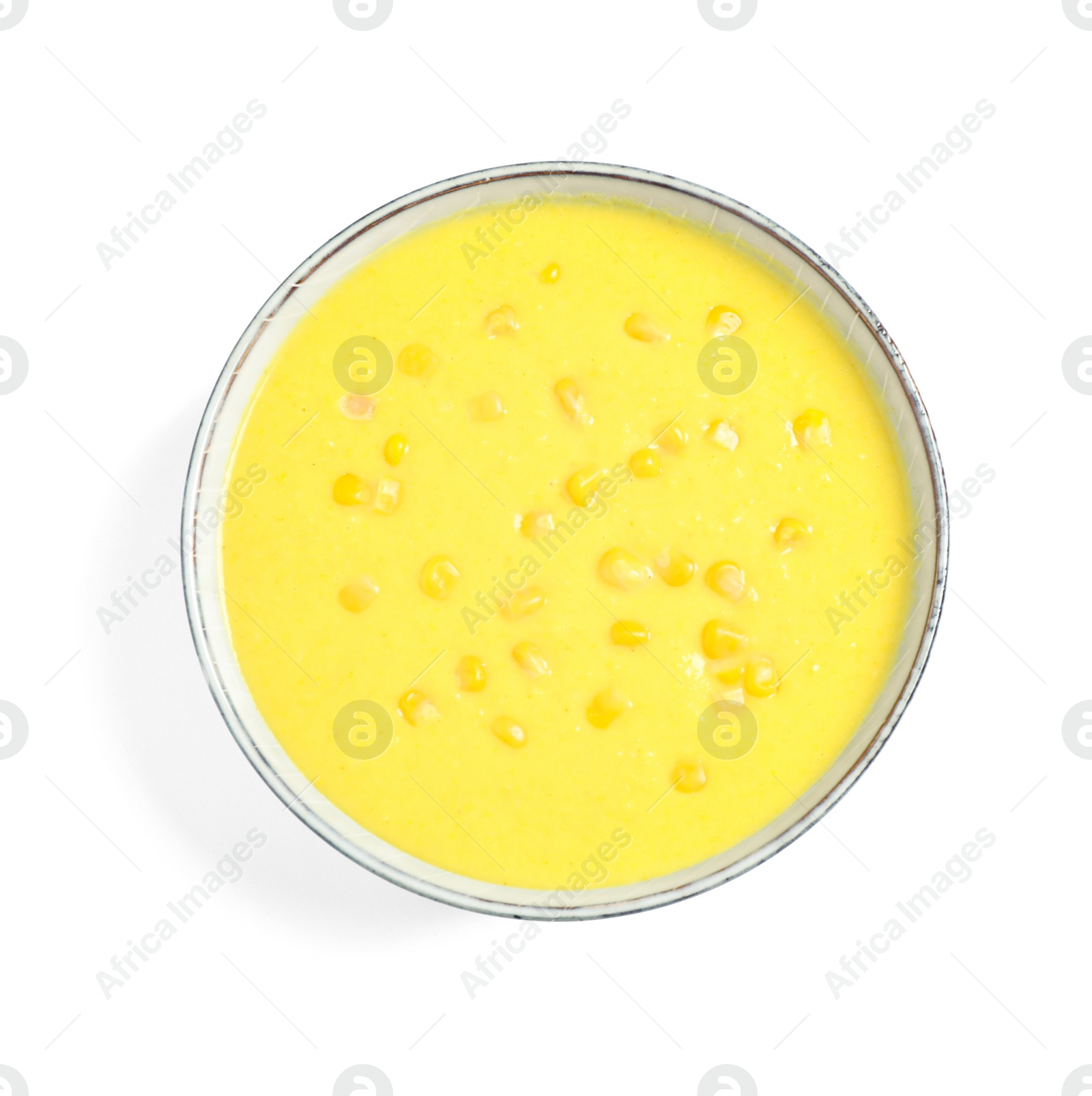 Photo of Delicious creamy corn soup isolated on white, top view