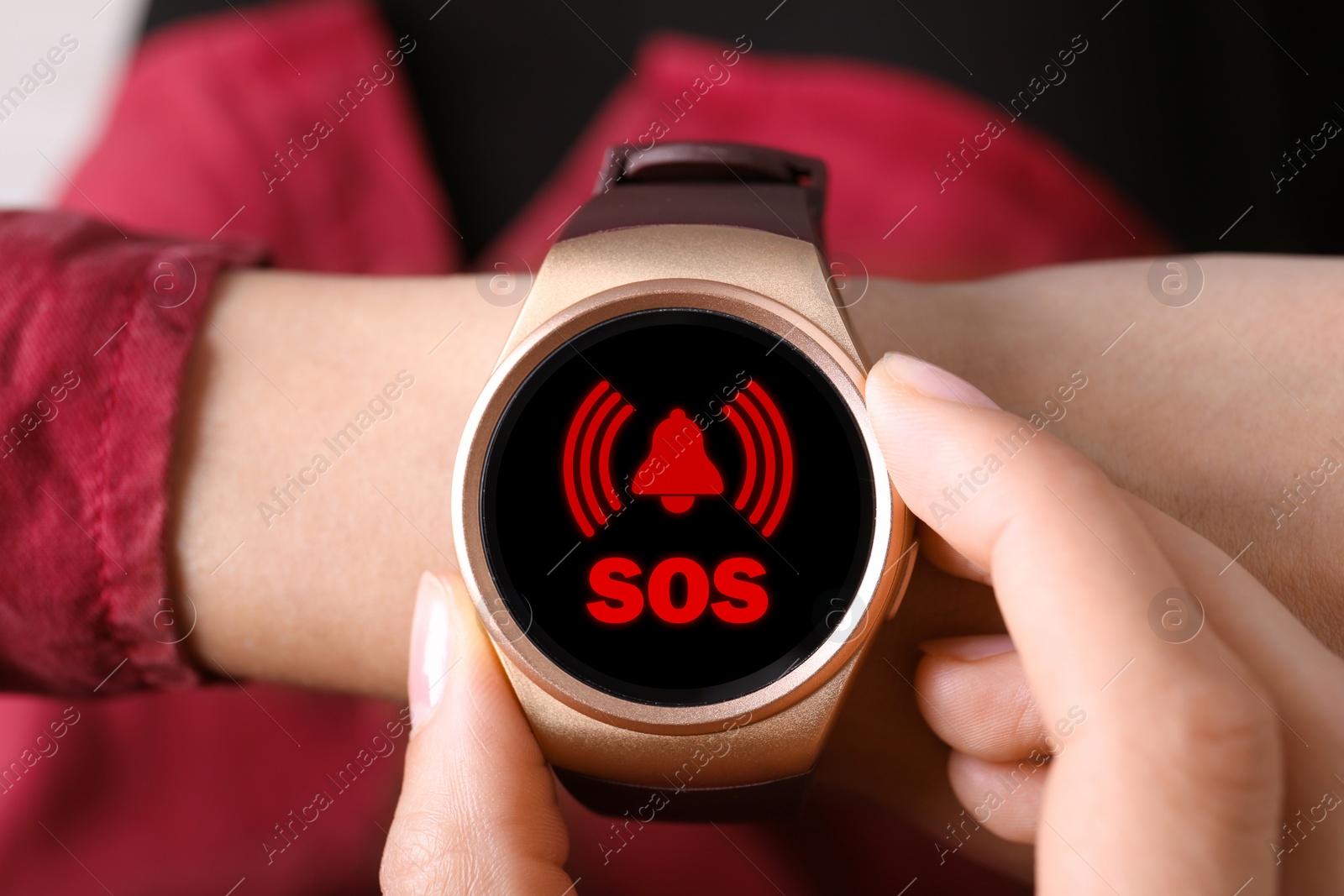 Image of Woman using SOS function on smartwatch, closeup