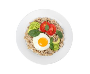 Photo of Delicious boiled oatmeal with fried egg, tomato, avocado and basil isolated on white, top view