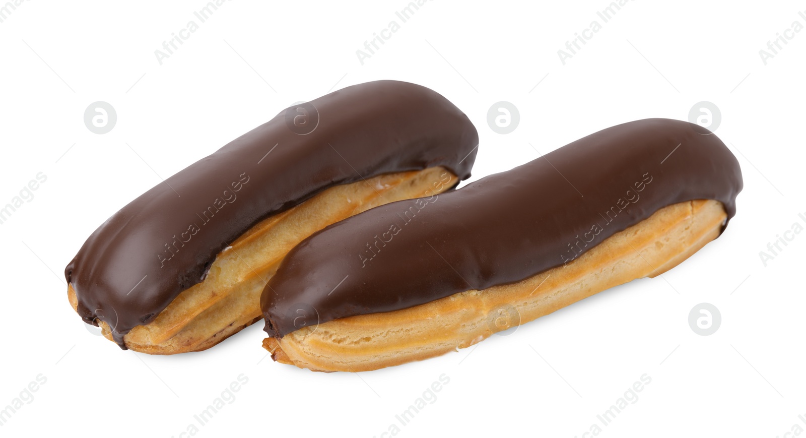 Photo of Delicious eclairs covered with chocolate isolated on white