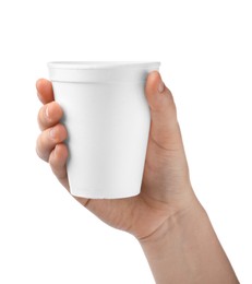 Photo of Woman holding styrofoam cup on white background, closeup