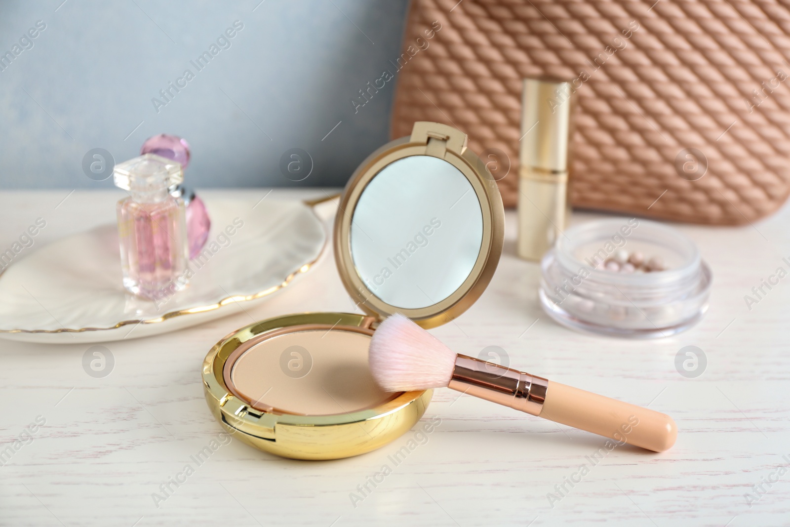 Photo of Set of luxury cosmetics on dressing table