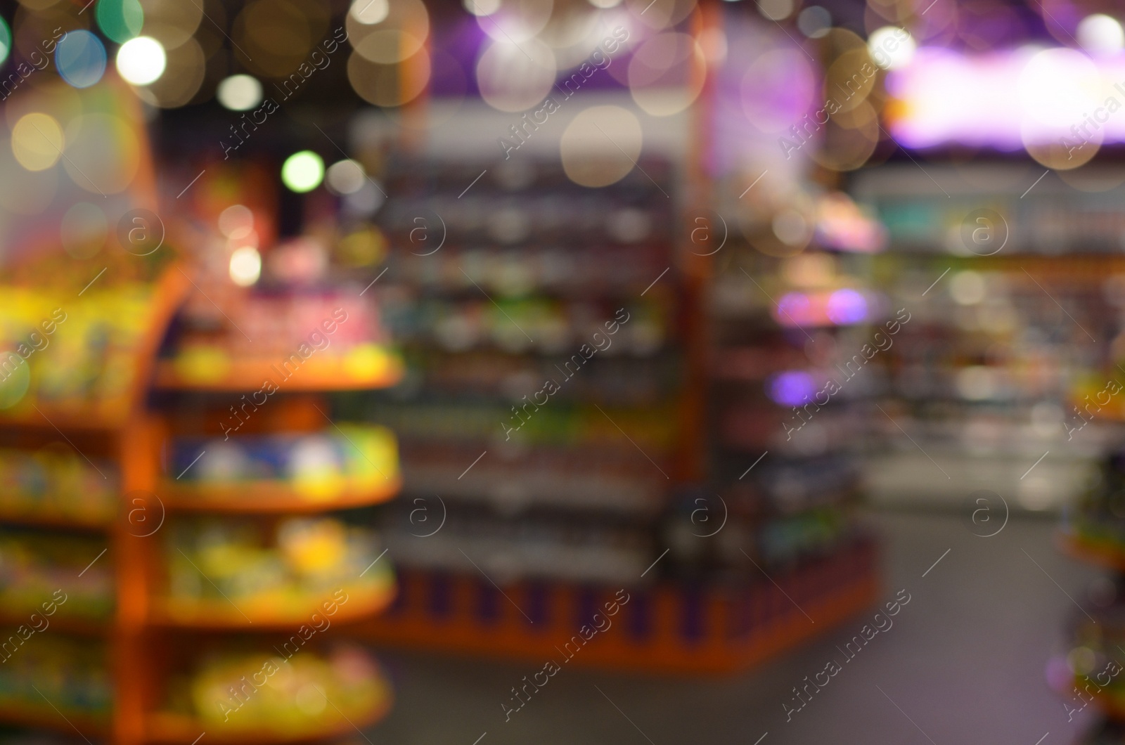 Photo of Blurred view of supermarket interior with different products