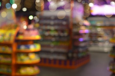 Blurred view of supermarket interior with different products