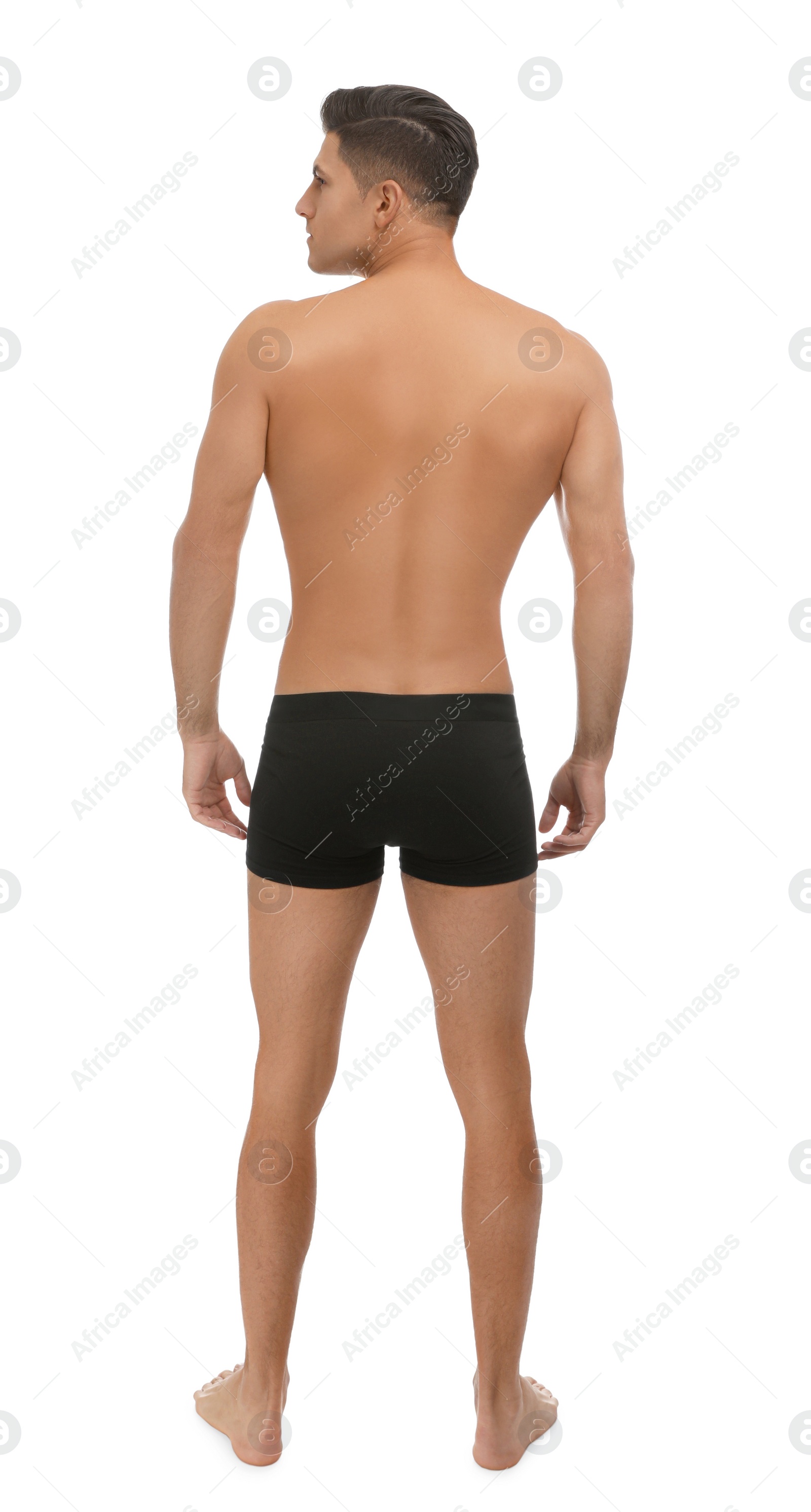 Photo of Handsome man in black underwear on white background