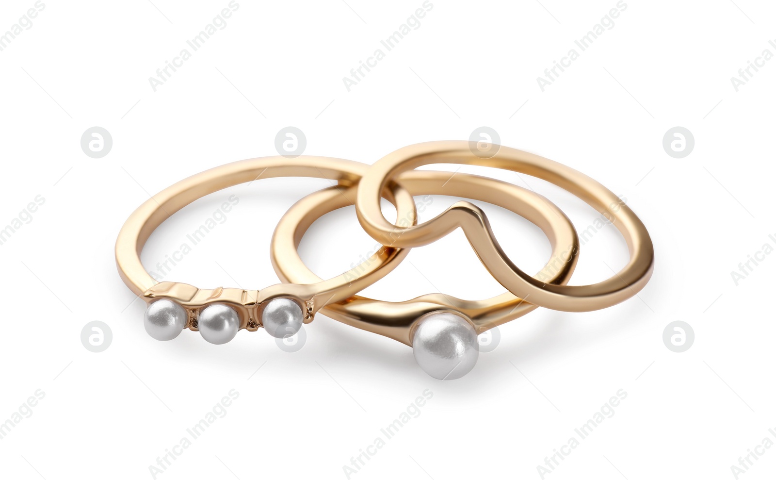 Photo of Elegant rings with pearls isolated on white