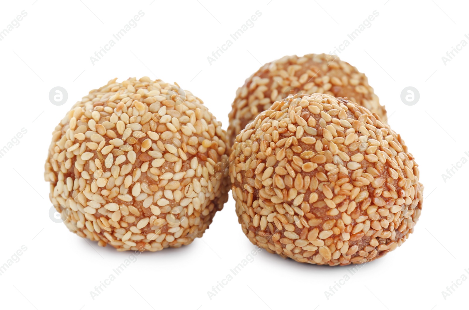 Photo of Many delicious sesame balls on white background