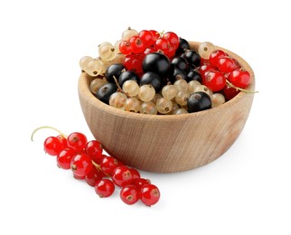 Bowl with fresh red, white and black currants isolated on white