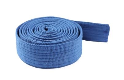 Photo of Blue karate belt isolated on white. Martial arts uniform