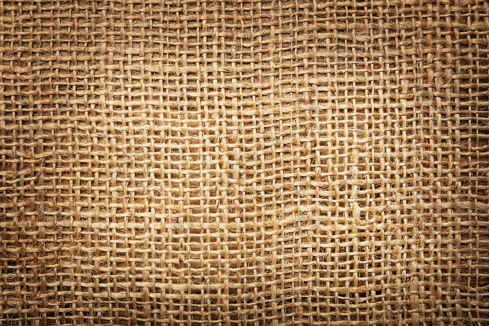 Image of Texture of natural burlap fabric as background, top view. Vignette effect 