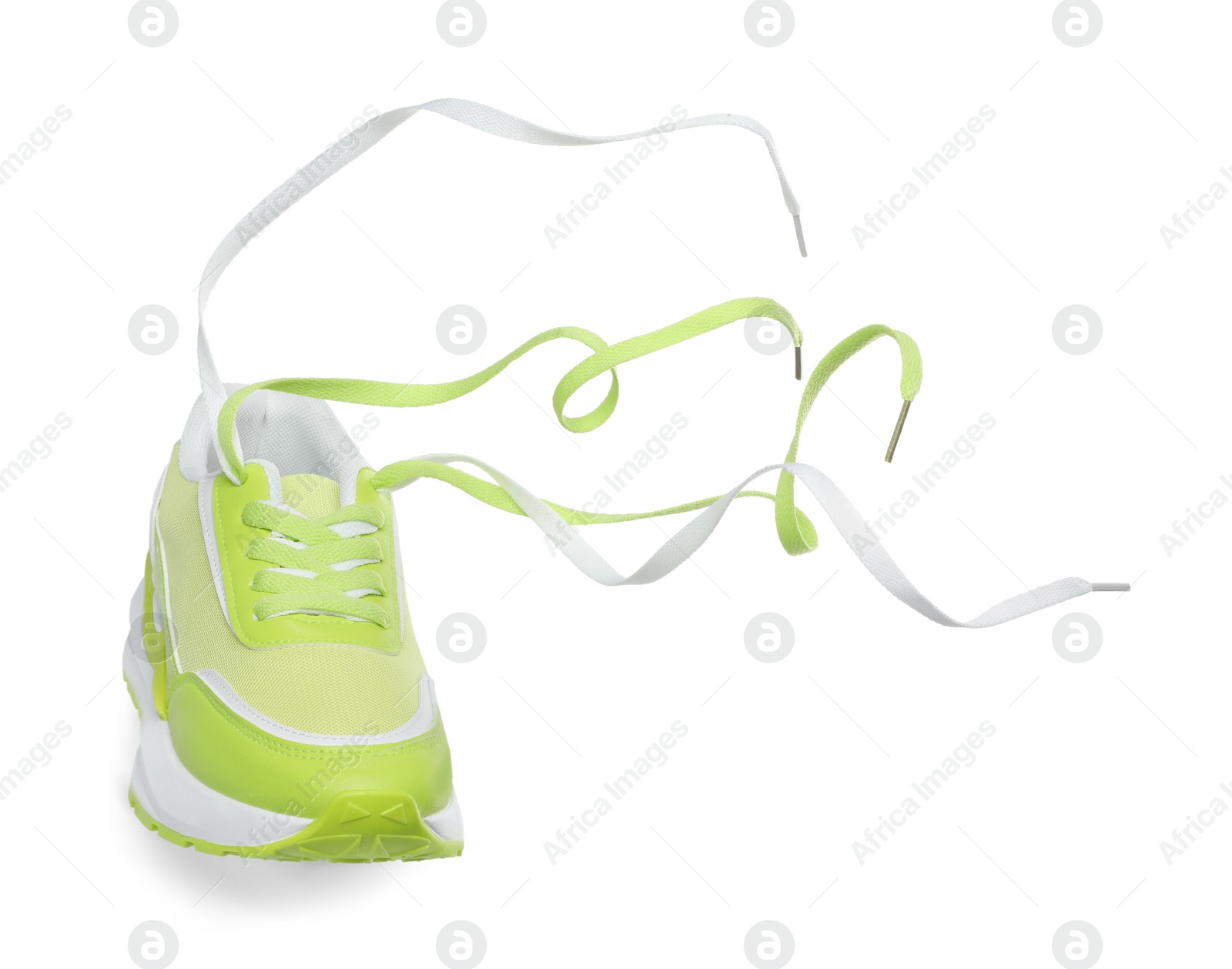 Photo of One stylish light green sneaker isolated on white