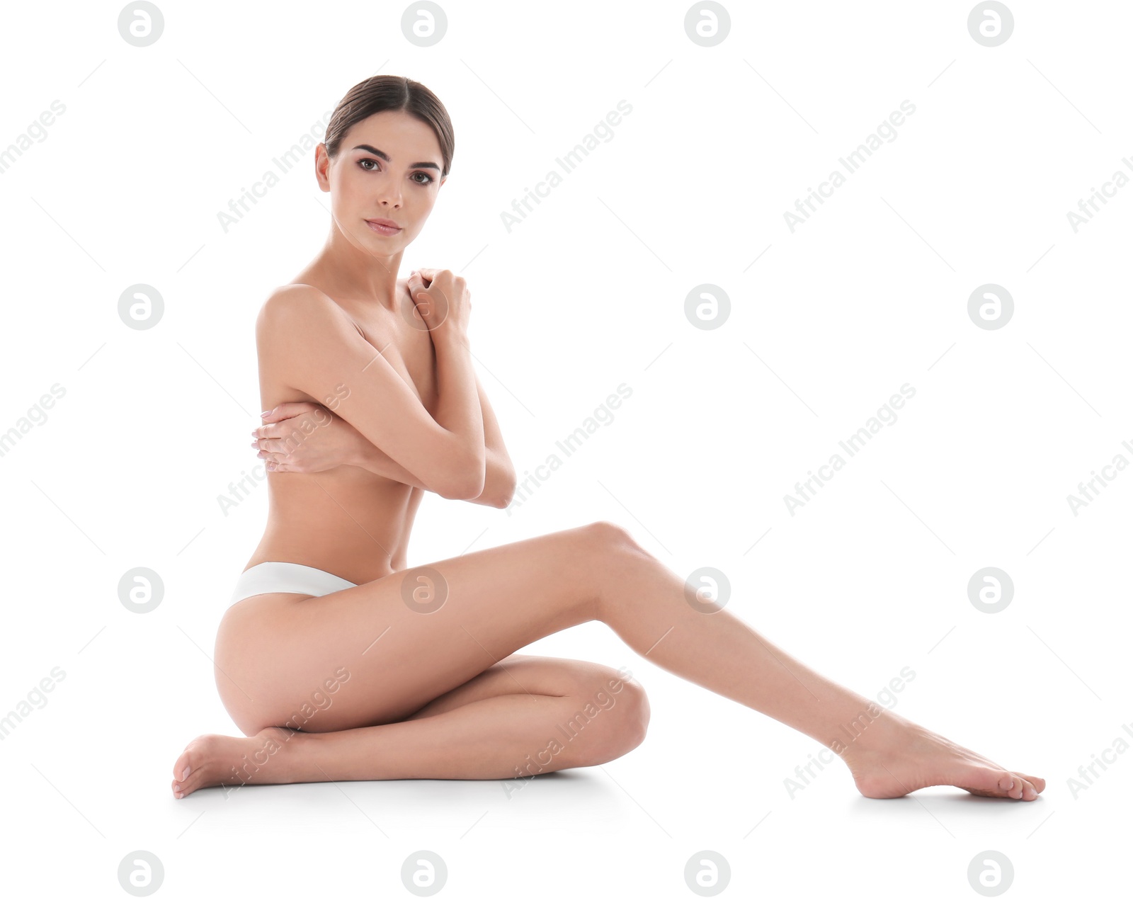 Photo of Young woman with perfect smooth skin on white background. Beauty and body care