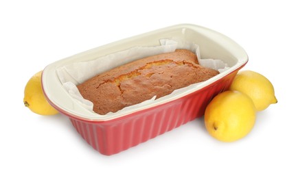 Photo of Tasty lemon cake in baking dish and citrus fruits isolated on white