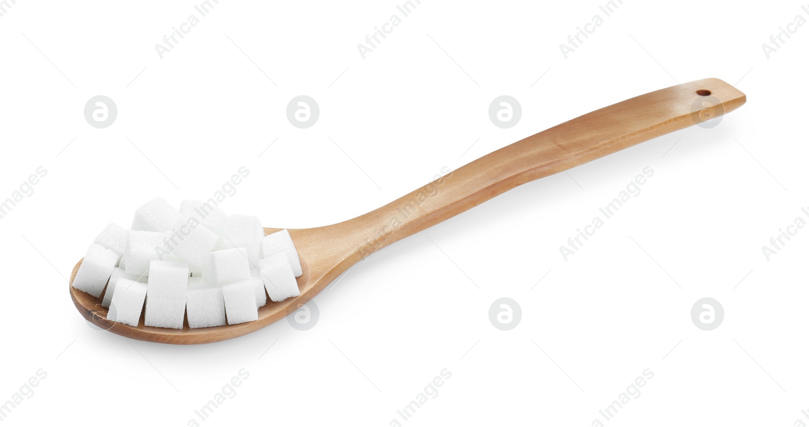 Photo of Sugar cubes in wooden spoon isolated on white