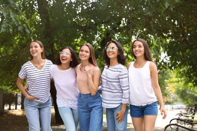 Happy women outdoors on sunny day. Girl power concept