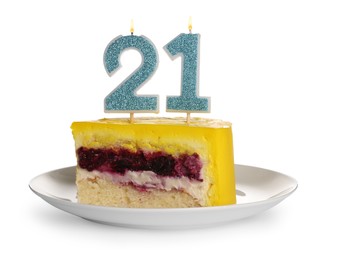 Photo of Coming of age party - 21st birthday. Delicious cake with number shaped candles on table against white background