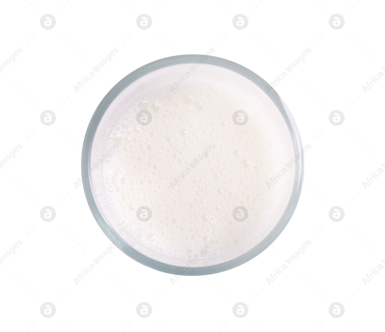 Photo of Glass of tasty milk isolated on white, top view