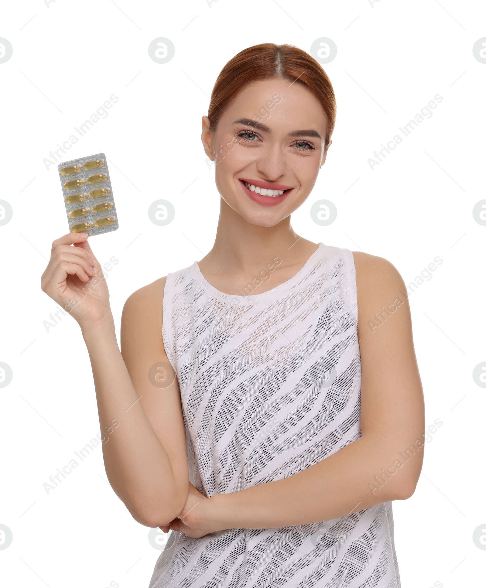 Photo of Happy young woman with pills on white background. Weight loss