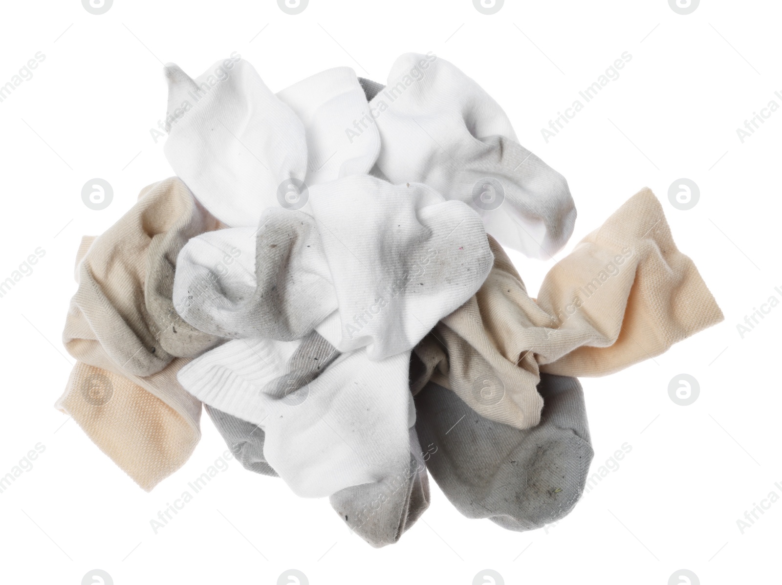 Photo of Different dirty socks on white background, top view