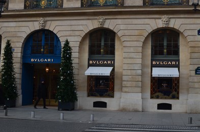 Photo of Paris, France - December 10, 2022: Bulgari store exterior with Christmas decor