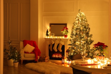 Fireplace in beautiful living room decorated for Christmas