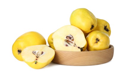 Photo of Ripe whole and cut quinces isolated on white