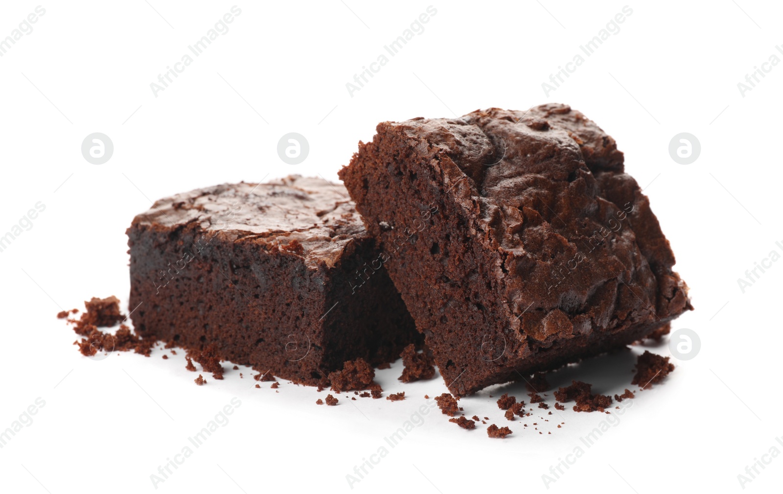 Photo of Pieces of fresh brownie on white background. Delicious chocolate pie