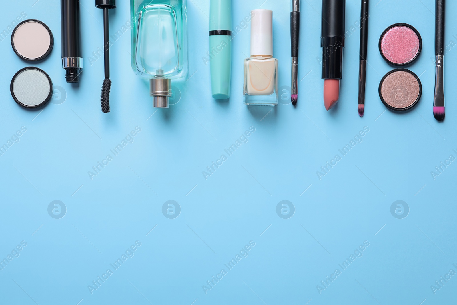 Photo of Flat lay composition with decorative cosmetics on color background