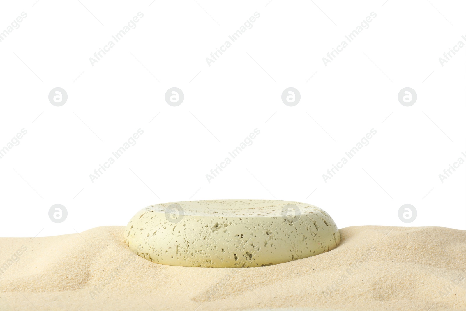 Photo of Presentation of product. Stone podium on sand against white background. Space for text