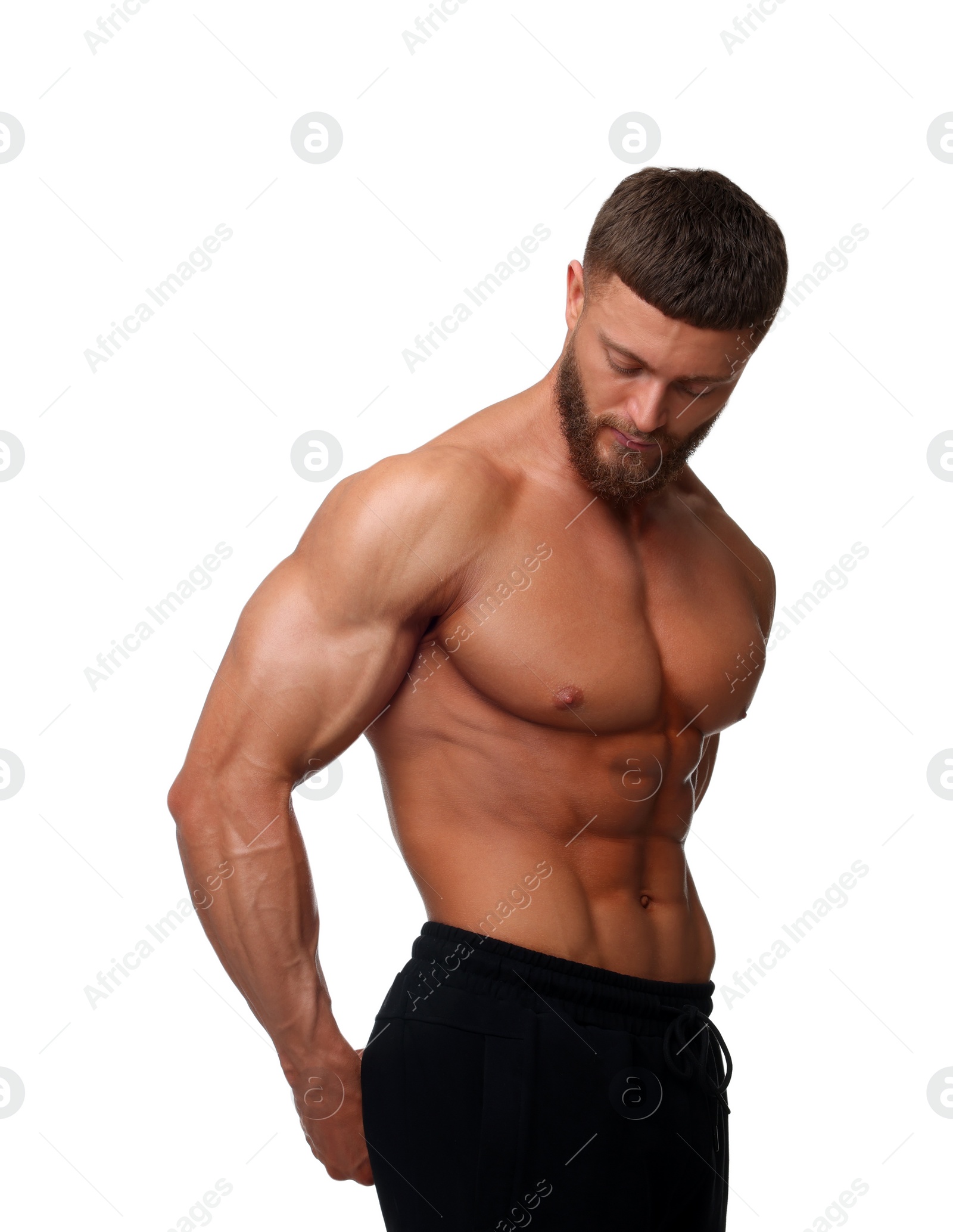 Photo of Young bodybuilder with muscular body on white background