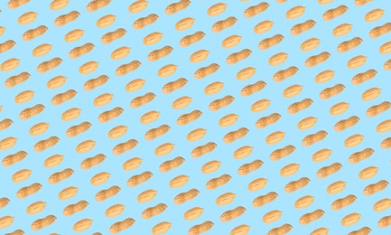 Image of Pattern of peanuts on light blue background