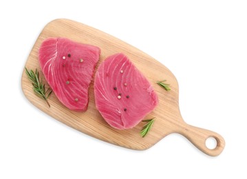 Photo of Raw tuna fillets with peppercorns and rosemary on white background, top view