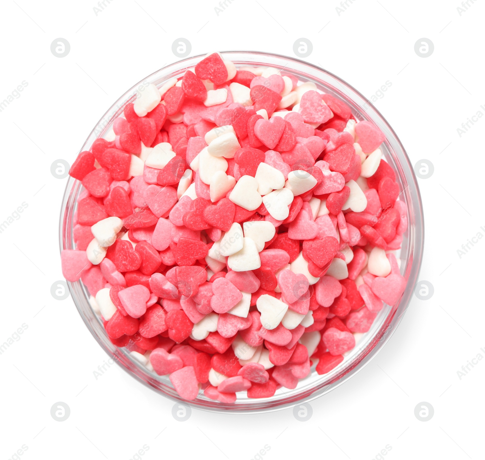 Photo of Sweet candy hearts in bowl on white background, top view