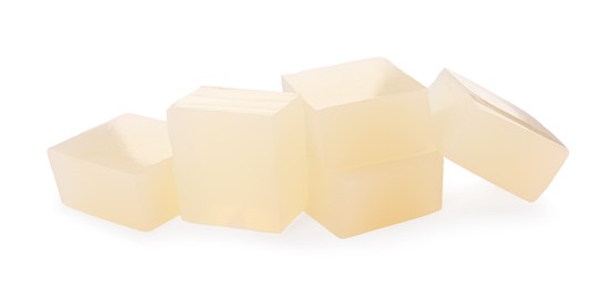 Photo of Many agar-agar jelly cubes on white background