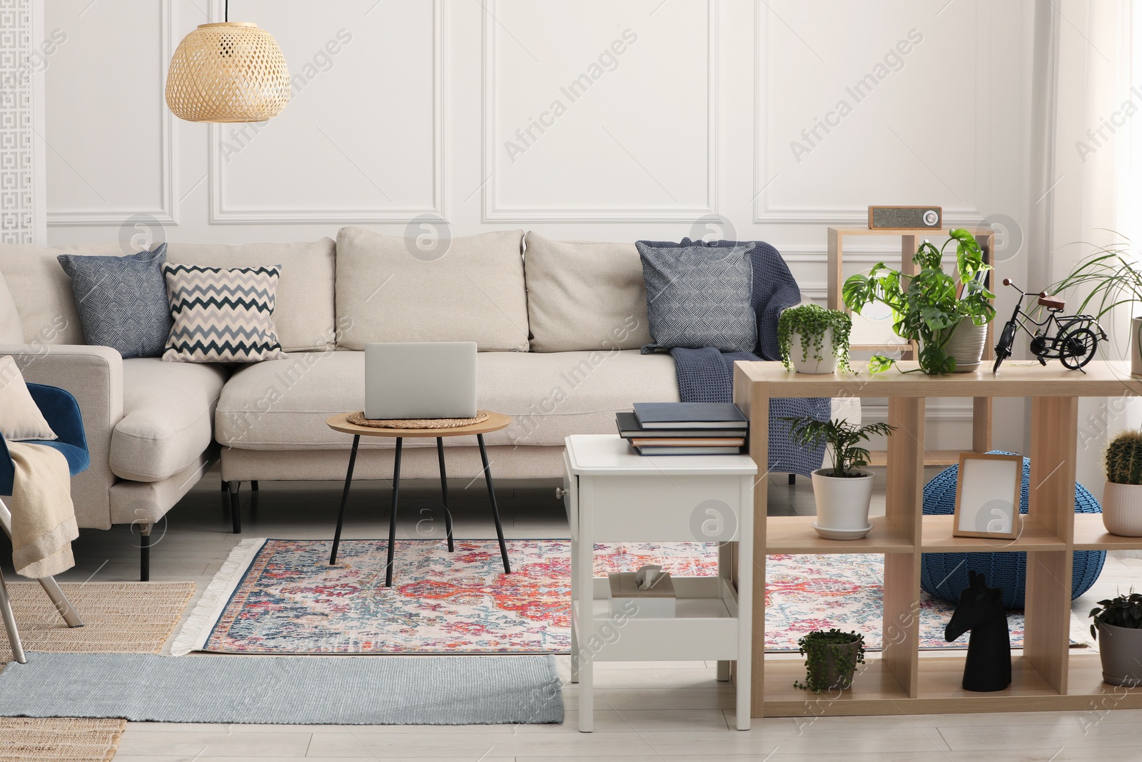 Photo of Stylish living room with beautiful carpet and modern furniture. Interior design