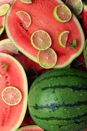Photo of Juicy watermelon with lime and mint as background, top view