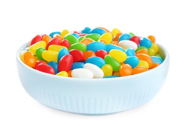 Bowl of tasty jelly beans on white background