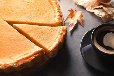 Fresh delicious homemade pumpkin pie on table, closeup