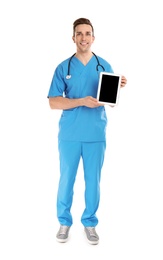 Photo of Medical assistant with stethoscope and tablet on white background. Space for text