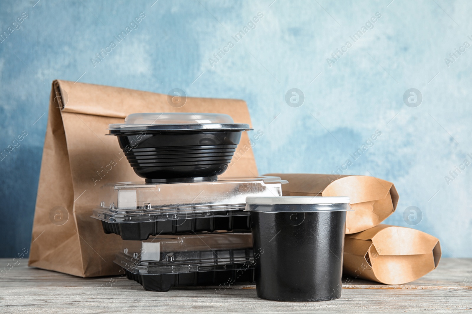 Photo of Various takeout containers on table. Food delivery service