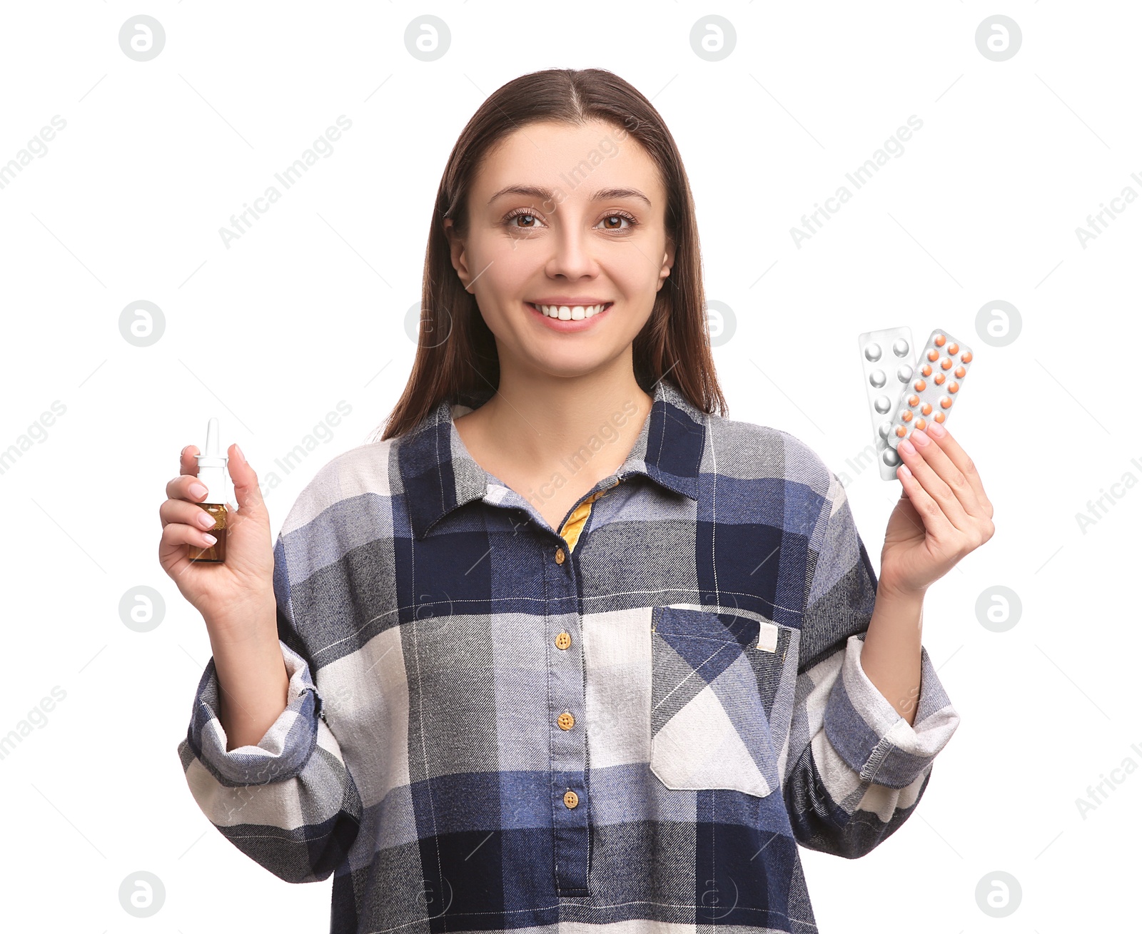 Photo of Woman with nasal spray and pills on white background