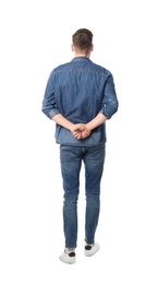 Photo of Young man in casual clothes posing on white background