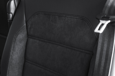 Photo of Car seat with leather upholstery, closeup view