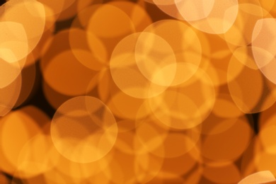 Photo of Beautiful golden lights as background. Bokeh effect