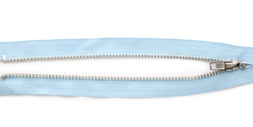 Photo of Light blue zipper on white background, top view